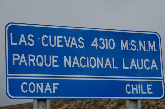 Information signal indicating the place and altitude. Las Cuevas. Lauca National Park. Arica y Parinacota Region. Chile.