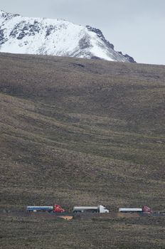 Trucks on a road of the Lauca National Park. Arica y Parinacota Region. Chile.