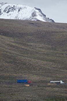 Trucks on a road of the Lauca National Park. Arica y Parinacota Region. Chile.