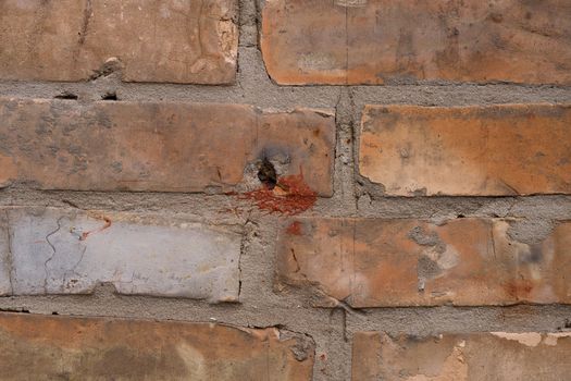 Old orange brick wall pattern. Brick background. Good wallpaper. Stock photo of old wall.