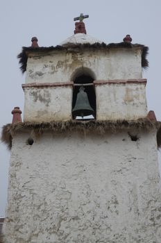 Bell tower of the Parinacota church. Lauca National Park. Arica y Parinacota Region. Chile.