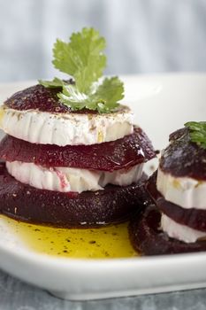 beetroot slices with goat cheese and oil