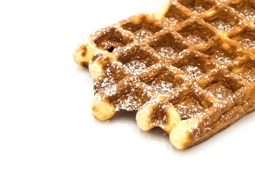 Freshly baked Belgian waffles, close-up. Dessert, color, white background