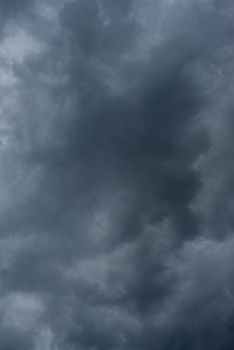 Dark black clouds in the sky, Stormy rain clouds background.