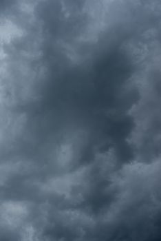 Dark black clouds in the sky, Stormy rain clouds background.