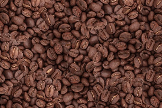 Roasted coffee beans background. Close up