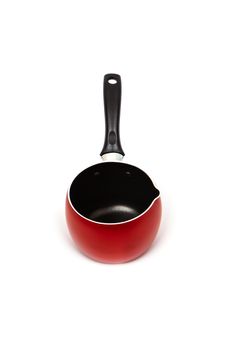 Empty Non-stick red Cooking Pot or Saucepan hat with a long handle, isolated on white background.