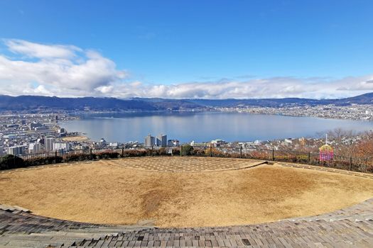 Japan town, resident buildings, outdoor park near bay with white cloud and blue sky