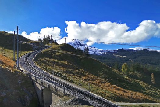 The track of train and cable in Switzerland Grindelawld mountain