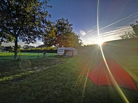 The outdoor camping tent, park in Switzerland countryside campsite