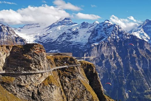 The Grindelwald first cliff walk, in Switzerland Jungfrau mountain with upper air parachuting