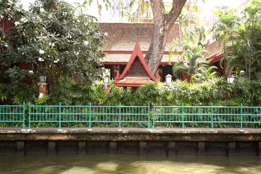 The Thailand temple, river, footpath and tree at daytime