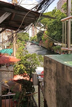 The Thailand tourist canal boat on village river at daytime