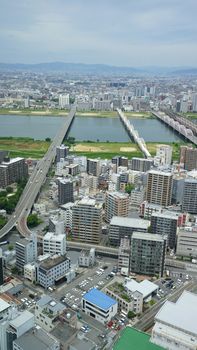 Japan Osaka cityscape, commercial and residential building, road aerial view