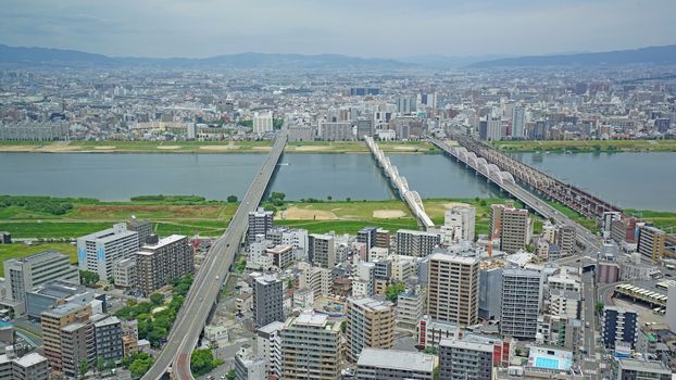 Japan Osaka cityscape, commercial and residential building, road aerial view