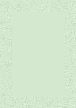 The pastel green textured background paper with embossed floral border