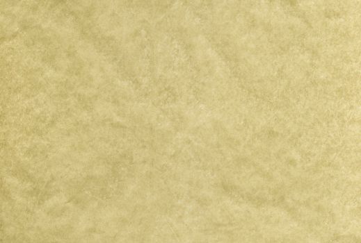 The Yellow blank crumpled and grungy textured paper background