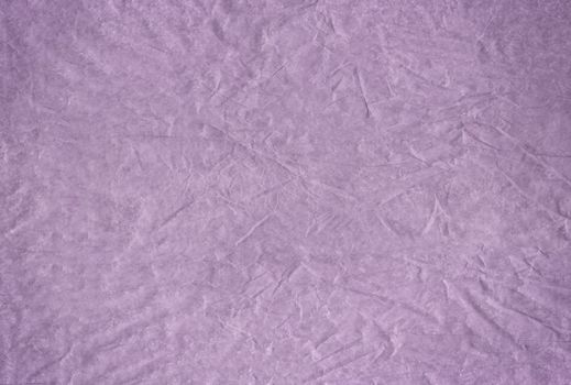 The Purple blank crumpled and grungy textured paper background