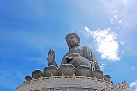 The large outdoor bronze statue of  seated Tian Tan Buddha in Hong Kong