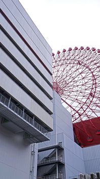 The red huge wheel ferris building in Japan Osaka