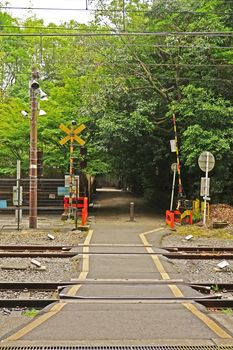 The vertical outdoor train track with traffic alert light in Japan countryside