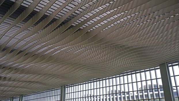 The window, interior and ceiling of airport archtecture terminal building