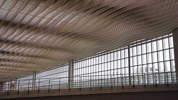 The window, interior and ceiling of modern airport archtecture terminal building