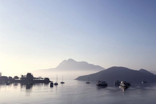 The recreation boats on the lake in the morning