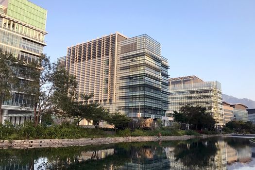 modern commercial office building, tree and the river