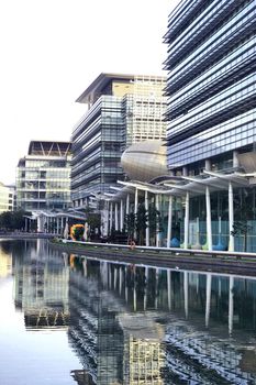 modern commercial office building, tree and the river