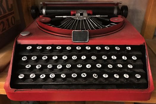 The black and Red vintage metal keyboard machine