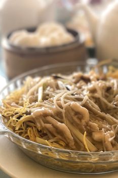 Traditional Chinese food, noodles, bread and the teapod