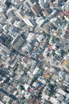 Japan Tokyo cityscape, road, commercial and residential building from aerial view