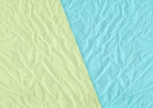 The green, blue blank crumpled and grungy textured paper background