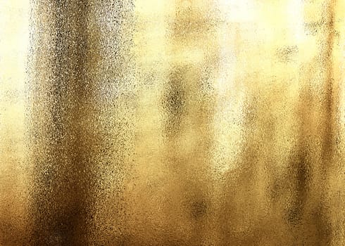The golden shiny abstract metallic textured background