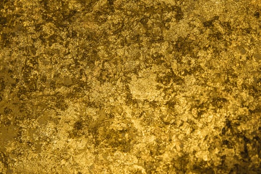 The golden pieces and sequins textured background