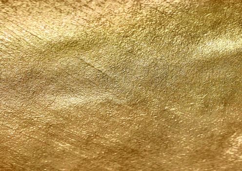 The golden blank overlay textured metallic paper background with pattern details