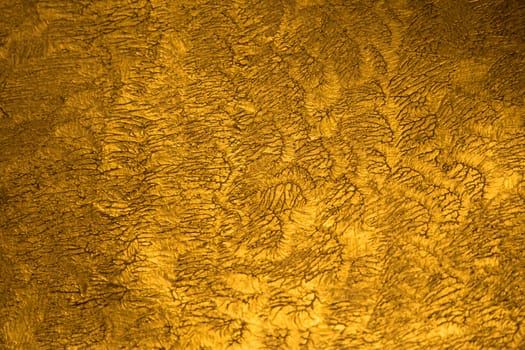 The golden metallic shinny textured background with detail pattern