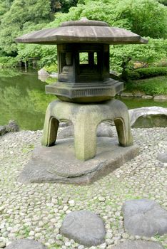 Japanese outdoor stone lantern in the zen garden