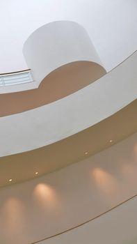 Indoor white wall and ceiling of the building with spot light