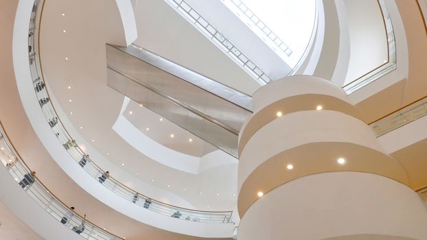 The indoor white wall and ceiling of the exhibition building