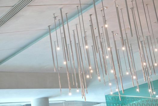 The modern indoor design lighting system on the ceiling 