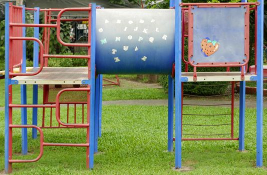Closeup colorful outdoor childhood recreation playground equipment