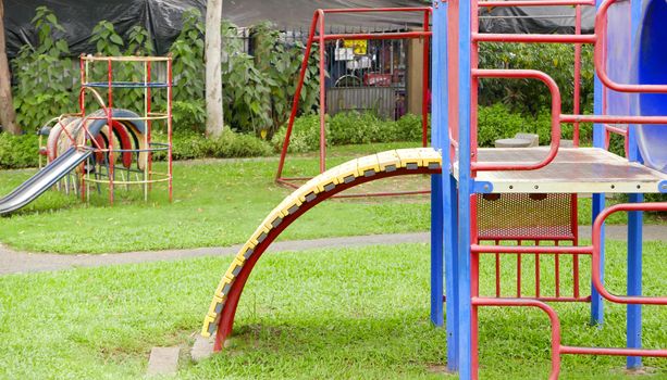 Closeup colorful outdoor childhood recreation playground equipment