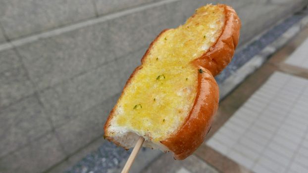 Fresh barbeque outdoor butter garlic bread in Thailand 