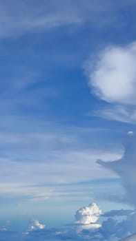 Vertical blue sky cloudscape frame layout background
