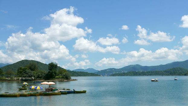 Park, mountain, pier and lake in the countryside park