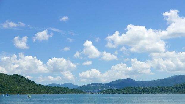 Water sport windsurfing, blue sky and the white cloud