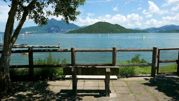 Outdoor bench, mountain and watersport wind surfing 