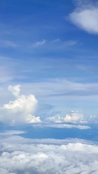 Vertical blue sky cloud background from the aerial view